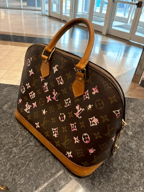 Designer handbag after Heel Quik leather repair and conditioning