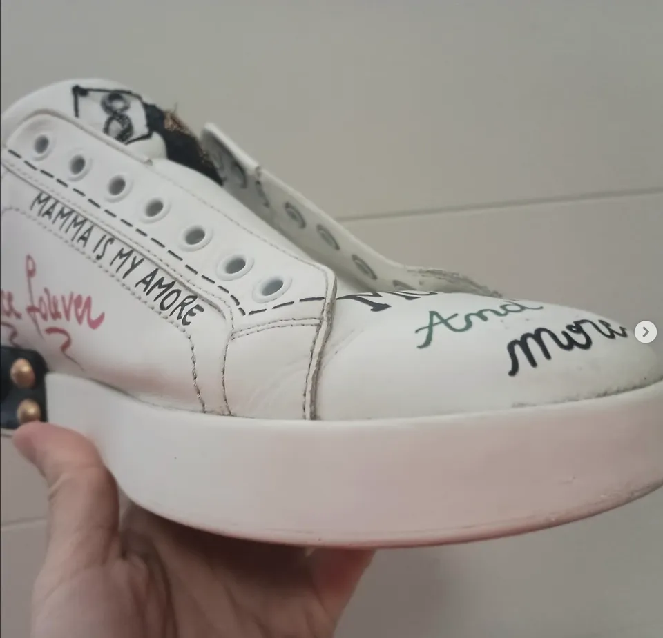 White sneaker after Heel Quik cleaning and ink/scuff removal