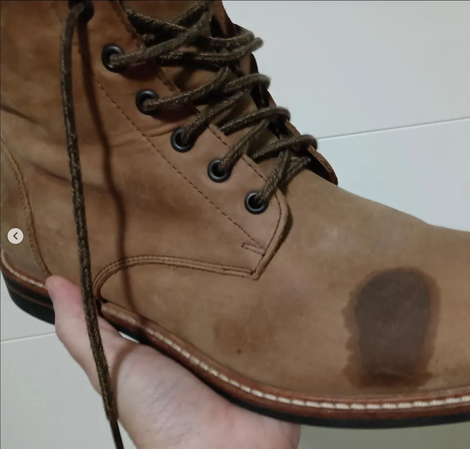 Worn suede shoe before Heel Quik care